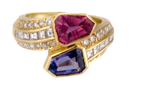 PLEASE VISIT LAUREN STANLEY IN NEW YORK<br />
<br />
An 18 karat gold, pink tourmaline, diamond and tanzanite ring - one-of-two-made - by Albert Lipten, of New York, of twist shape, with pave diamonds around the tourmaline and tanzantite.  Weight