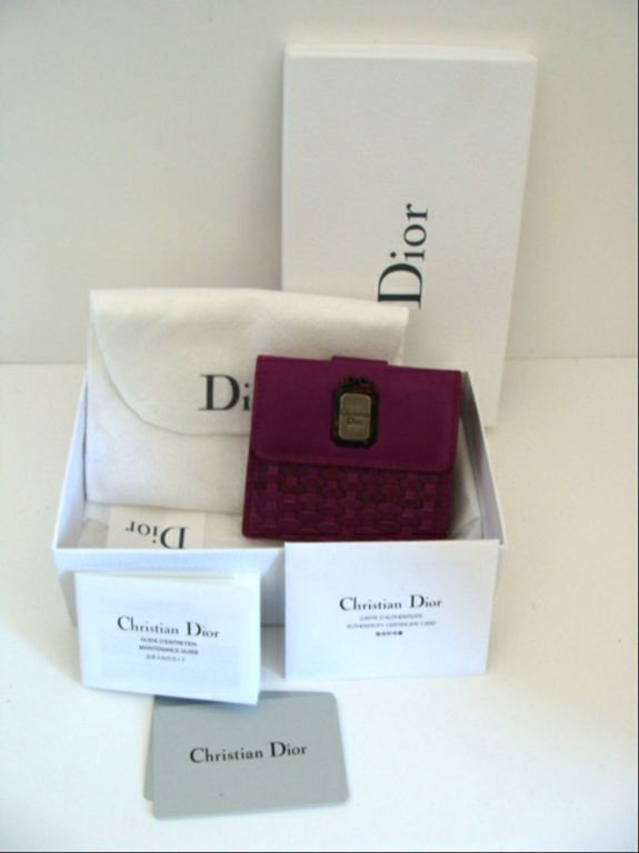 This unused, limited edition woven wallet by Christian Dior from the  2007 Samourai collection. <br />
 <br />
This would make a good gift for the collector - the original box, tags, sleeper bag, authenticity card, and sales receipt from Christian