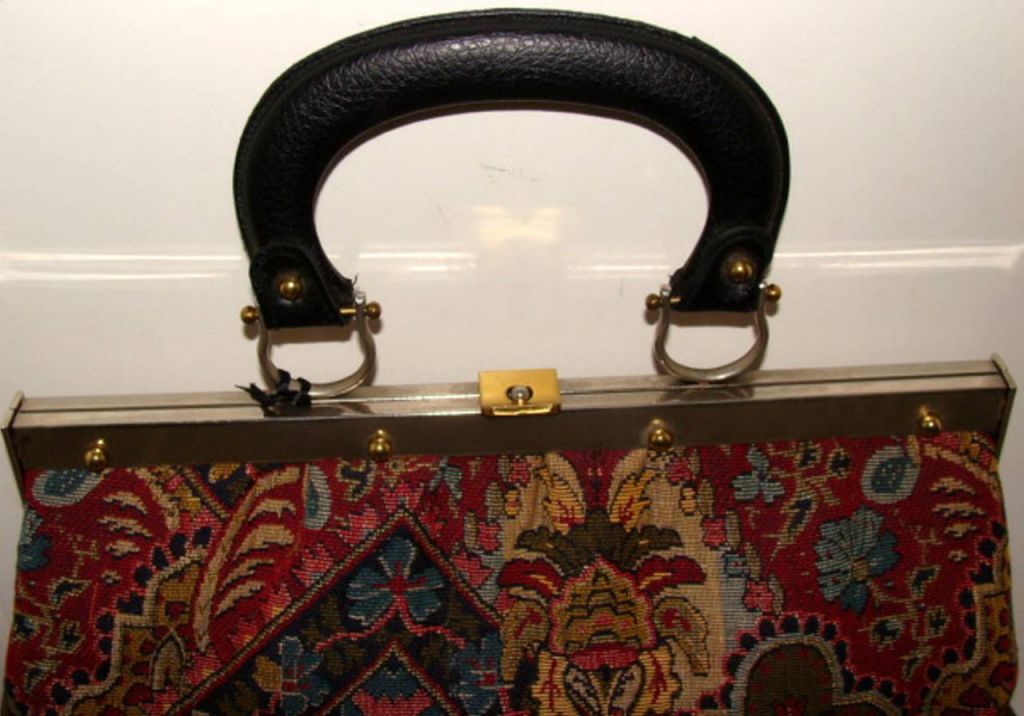 This oversized bag is a rare example--it is the only one we have seen in our 30 years of collecting.<br />
<br />
Rich and colorful tapestry.  Interior is capacious and has a wide opening to easily see all contents.<br />
<br />
By American