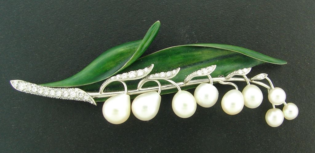 Delicate and sophisticated Lilies of the Valley Brooch created by Marcus & Co. in the 1930's. Amazing workmanship! Natural white pearls (GIA certificate provided), diamonds and finest green enamel over white gold.