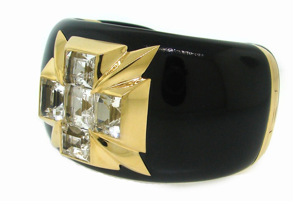 Stunning and bold cuff created by  Verdura in 2009.<br />
A beautiful black jade cuff with Maltese cross made of five square step cut white topazes set in yellow gold.<br />
The bracelet fits a wrist up to 6.5