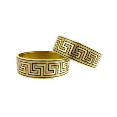 Pair of antique gold and black enamel cuffs.