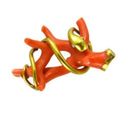 An Antique Coral Brooch with an Entwined Gold Snake