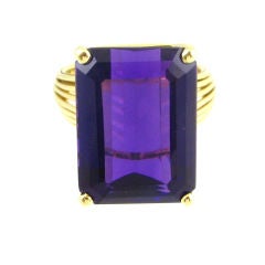 An amethyst ring with gold wirework