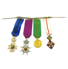 A set of four Edwardian regal medals.