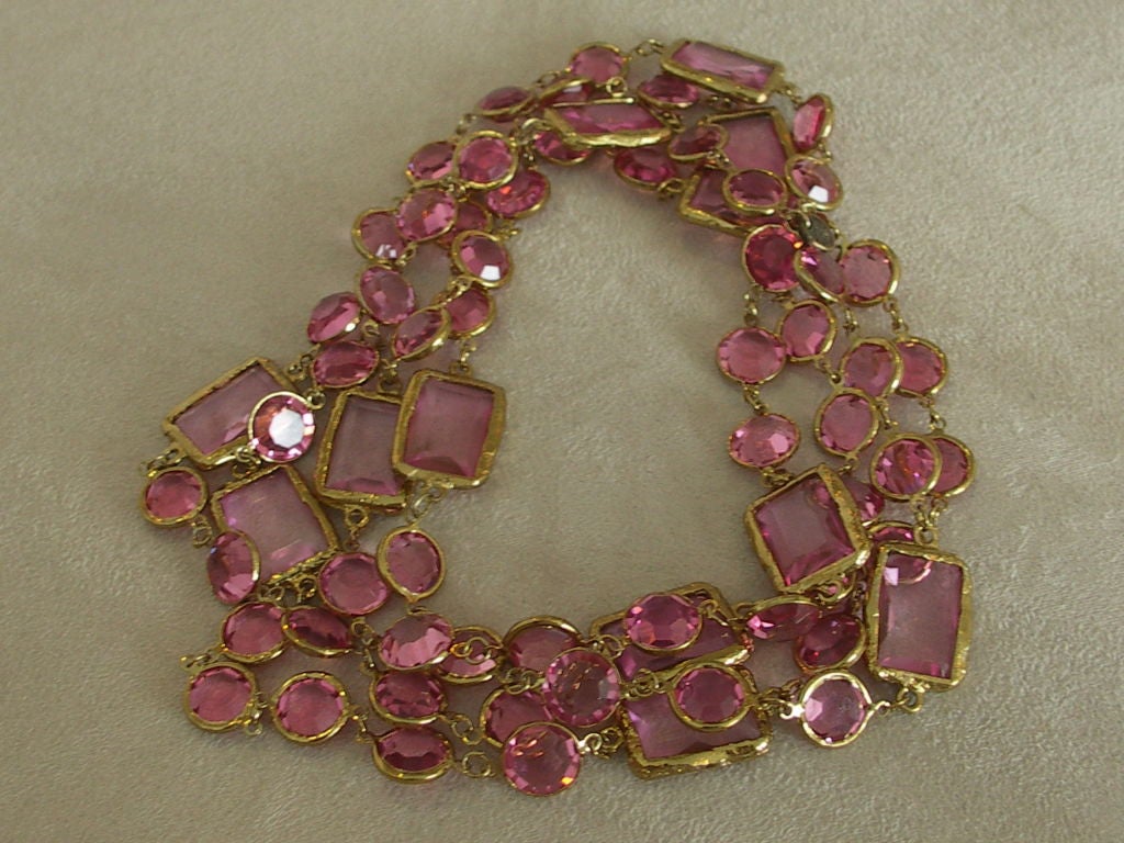 Dramatic pink and gold Chanel Sautior necklace. The super long necklace has a combination of pink rectanglar and circular faceted crystals.