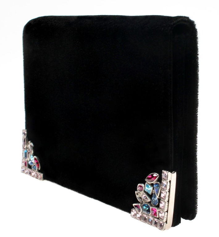 This is a beautiful evening clutch with embellished with crystal stones.<br />
It measures 8