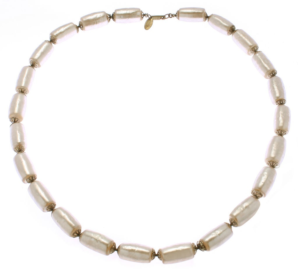 This is a great looking Haskell necklace with unusual shaped faux pearls.  This is beautiful when worn alone or looks great layered with other pieces.