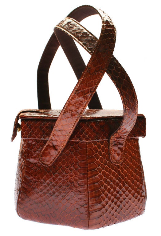 This is a great retro snakeskin handbag.  
The handle drop is 6 1/2