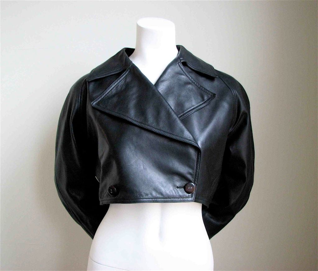 Amazing cropped leather jacket made of the softest leather imaginable. Button closure. Back vent. Fits a US size 4-8. VERY GOOD/EXCELLENT CONDITION.