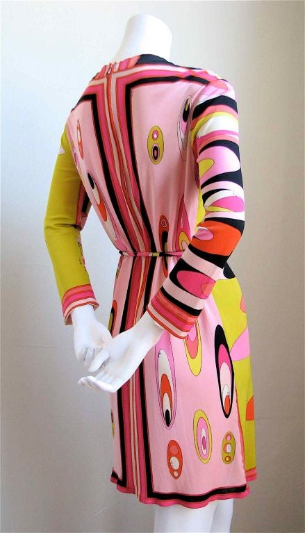 Striking silk jersey dress from Pucci. Very vivid and unique color combination. Matching beaded belt. Fits a US 4-8. Made in Italy. Very Good condition with a few very minor flaws.
