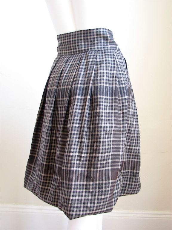 High waist bubble skirt from Miyake. Very early design. Fits a US 4 to 8 (buttons can easily be moved). Made in Japan. EXCELLENT CONDITION. Was $450. Now $225.