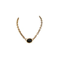 YSL gilt necklace with large black faceted center stone