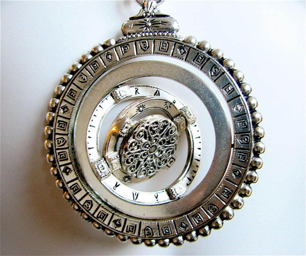 YVES SAINT Laurent silver astronomical armillary necklace at 1stDibs