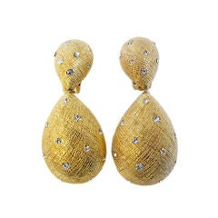 CHRISTIAN DIOR textured gold earrings with flush set rhinesontes