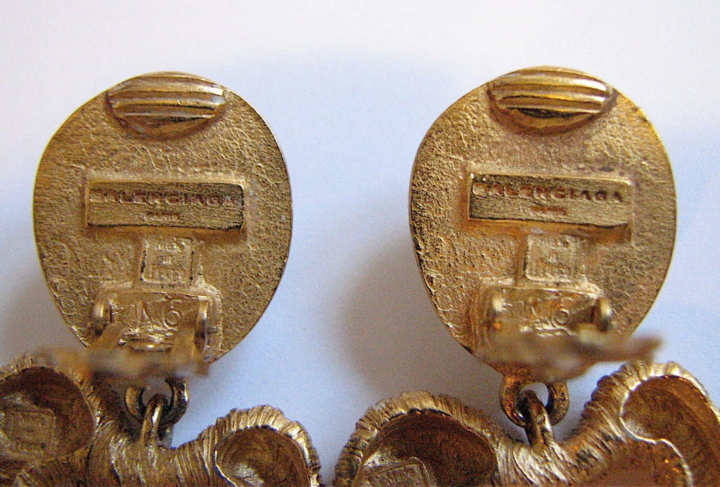 Unique stylized heart earrings with unusual natural reticulated quartz stones. Clips back. 2.5