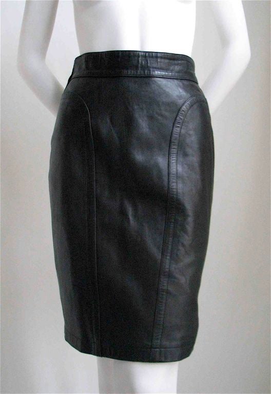 Amazing, butter soft leather skirt with very unique seams and stitching. Asymmetrical zipper follows the line of the seams. Side Vent. Fully lined. FR size 36/38. Approximate measurements are: Waist 25.25