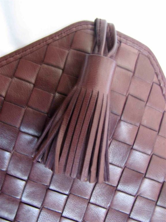 Women's BOTTEGA VENETA plum woven leather clutch with tassel