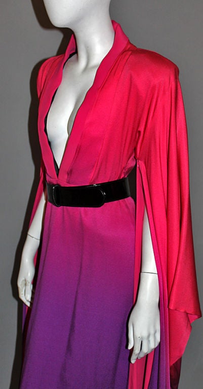 ALEXANDER MCQUEEN’s astonishing imagination comes to life in this incredible “Degrade Kimono” dress from one of the designer’s last collections. Sure to be a collector’s item, this amazing piece is composed of luscious silk fabric starting at the