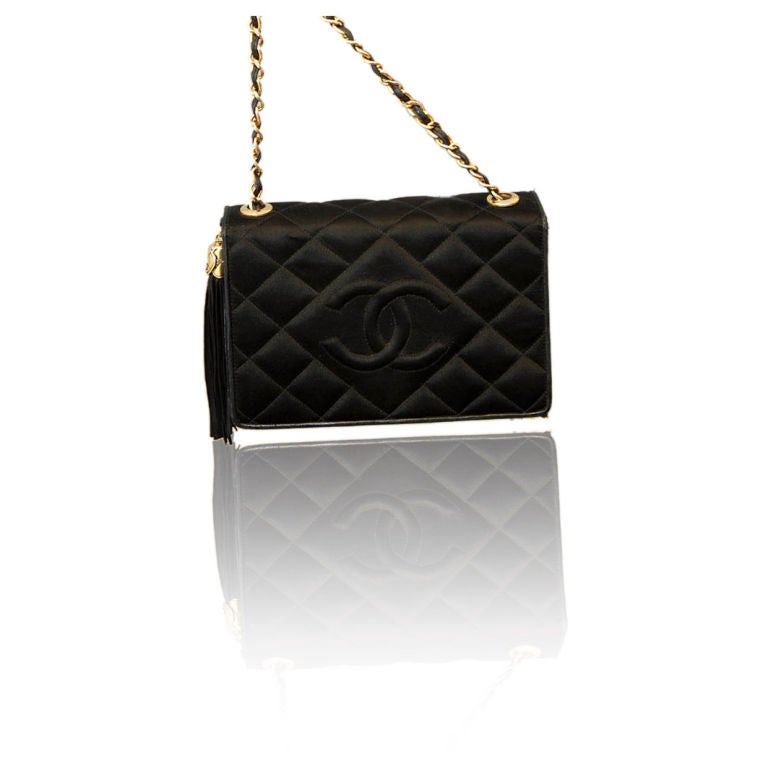 CHANEL Black Quilted Satin CC Logo Tassel Flap Bag