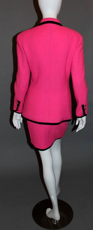 black and pink suit