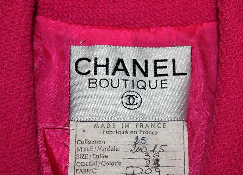 A Chanel pink and black boucle christmas tree with the