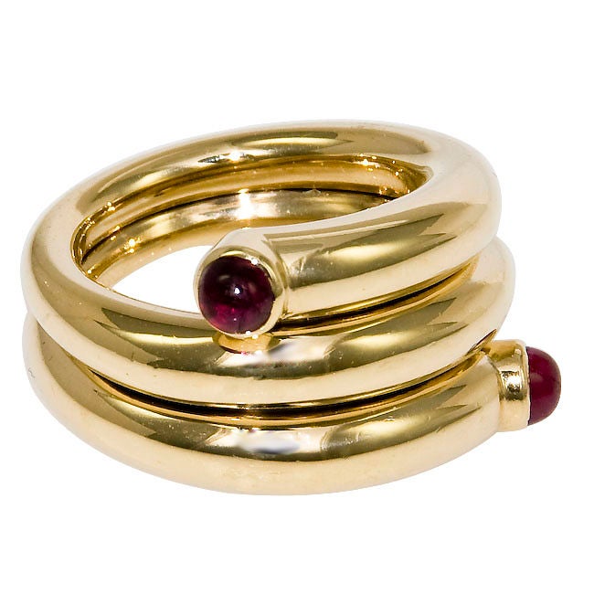 18K Yellow Gold Double Coil Ring by Jean Schlumberger for Tiffany & Company, set with 2 Cabachon Rubies.