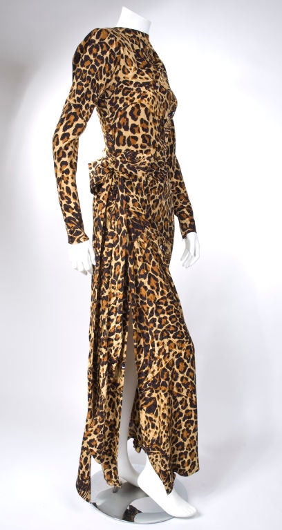 ** I am in Europe from 2/9/ to 2/18 please <br />
E-mail me for any questions. Thank you. **<br />
<br />
Iconic Yves Saint Laurent Leopard Print Gown.<br />
Jacquard silk in camel,brown and black.<br />
Zipper on the side,shoulder and wrist.