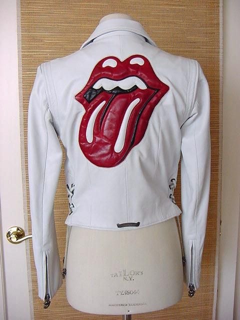 WOW!!! ROCK AND ROLL BABY! This is a Limited Edition creation in honor of the Rolling Stones and Mick Jagger.  <br />
White leather biker jacket with sterling hardware.<br />
All the silver hardware are the signature lips and tongue logo of the