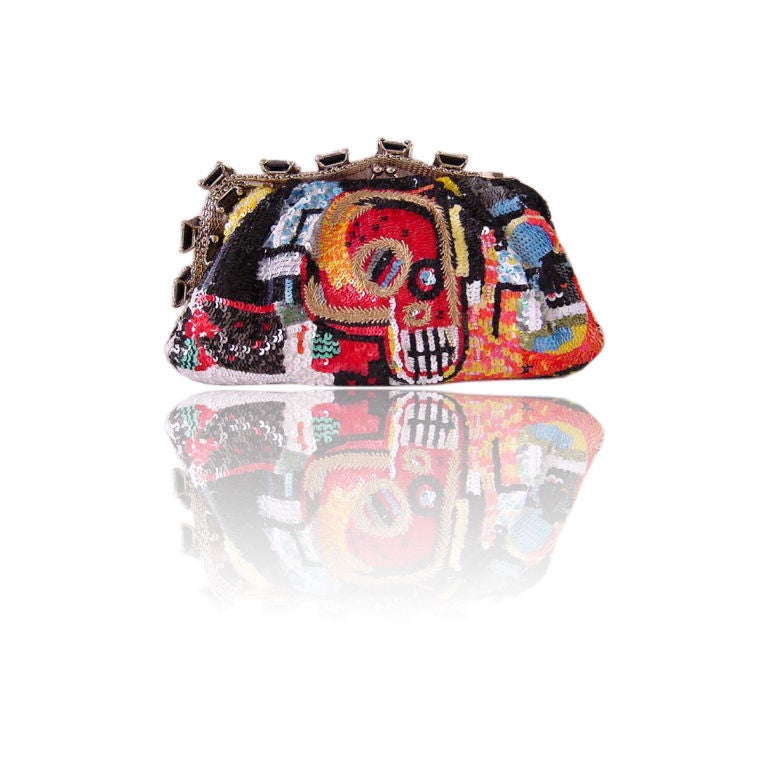 GORGEOUS VALENTINO LIMITED EDITION treasure! <br />
A tribute to Graffiti artist Jean-Michel Basquiat.  <br />
Encrusted with teeny sequins in a myriad of exquisite colours, the skull features the embroidery detail. <br />
Silver fine link 1 3/k