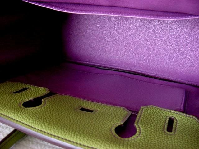 THIS COLOUR IS SO HOT! VERT ANIS, is no longer made at this time~  <br />
This beauty is a special order one of a kind! <br />
The interior is striking in VIOLET Chevre leather and the effect is exotic.  <br />
The violet top stitch detail