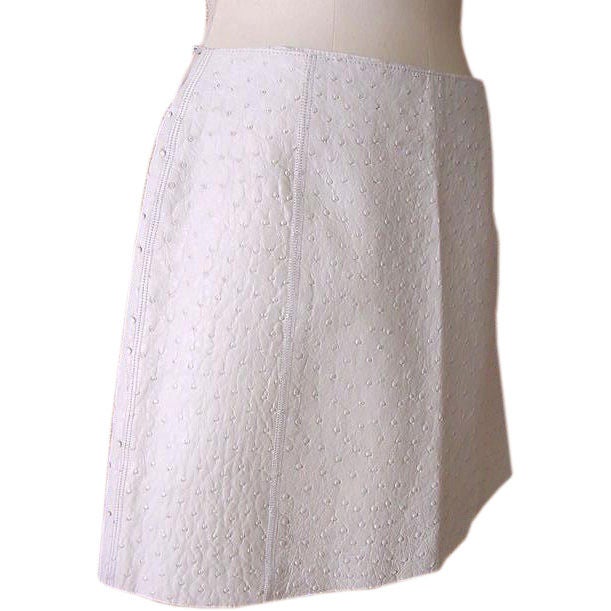 Prada limited edition white South African Ostrich skirt.
Sleek and chic this is a timeless piece.
Retails 6,000.00.
Only twenty made worldwide.
NEW or NEVER WORN. 
Final Sale

SIZE 40 
USA SIZE 6

SKIRT MEASURES:
LENGTH  16 1/4" 
WAIST  14