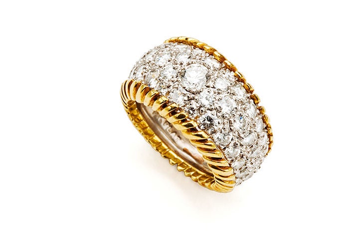 Diamond pave  and gold Stitch edged ring