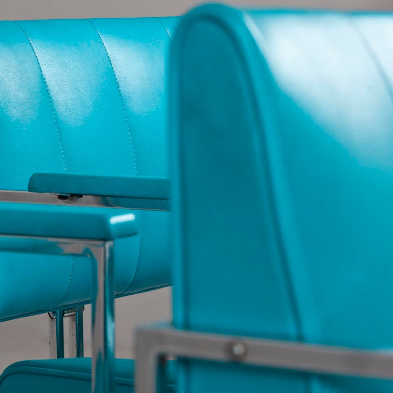 A Set of Four Turquoise Vinyl Upholstered Chairs 2