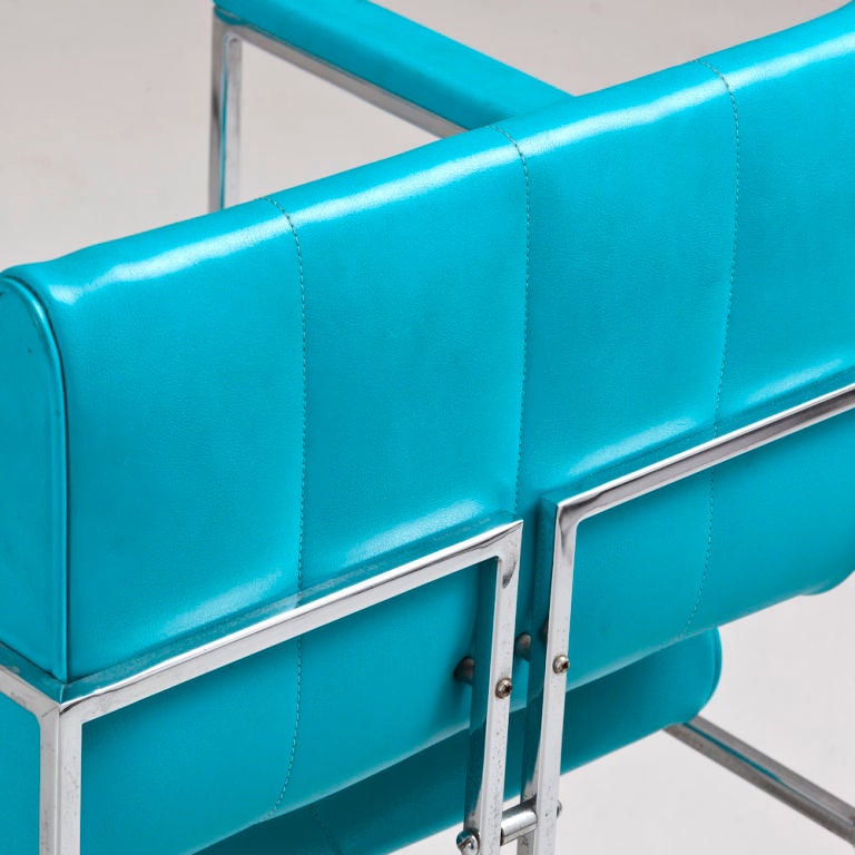 A Set of Four Turquoise Vinyl Upholstered Chairs 1