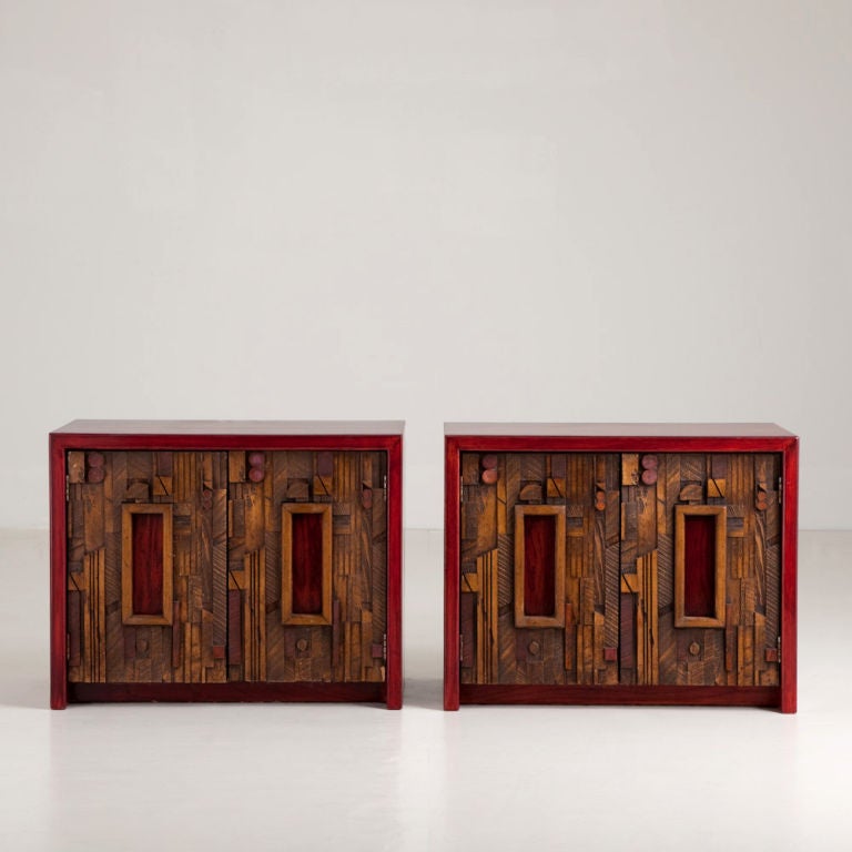 A Stunning Pair of Side Cabinets designed by Lane, Altavista, USA  from the Pueblo Collection, Cabinet Fronts set with Multi Geometric Shapes, highlighted in Red and with Stained Red Wood. Stamped with manufacturers seal 1960s, Talisman Edition