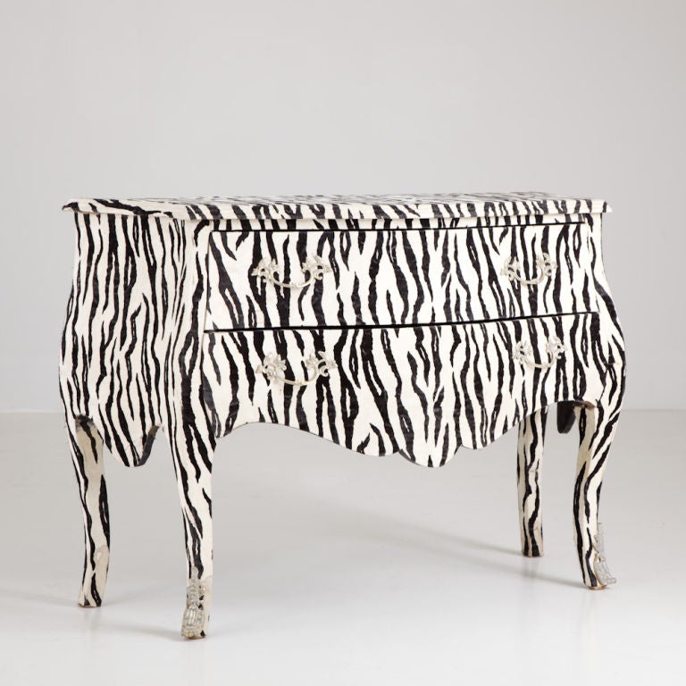 A 1970s Faux Zebra Skin Wrapped Two Drawer Bombe Commode