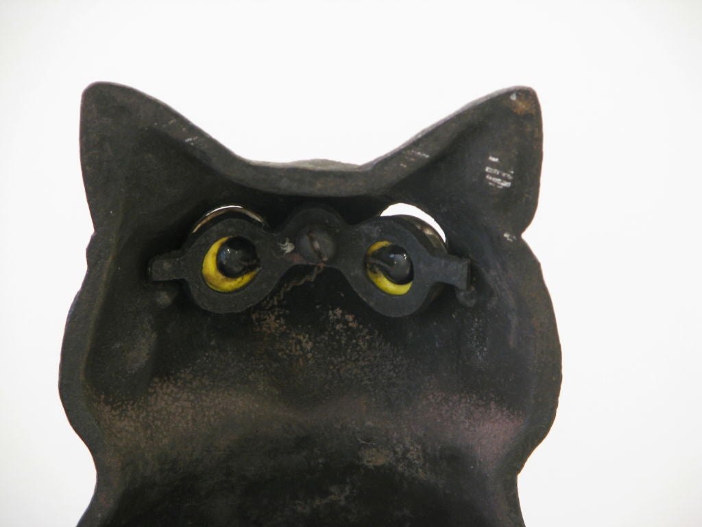 Pair of Cast Iron Black Cat Andirons with Yellow Glass Eyes 1
