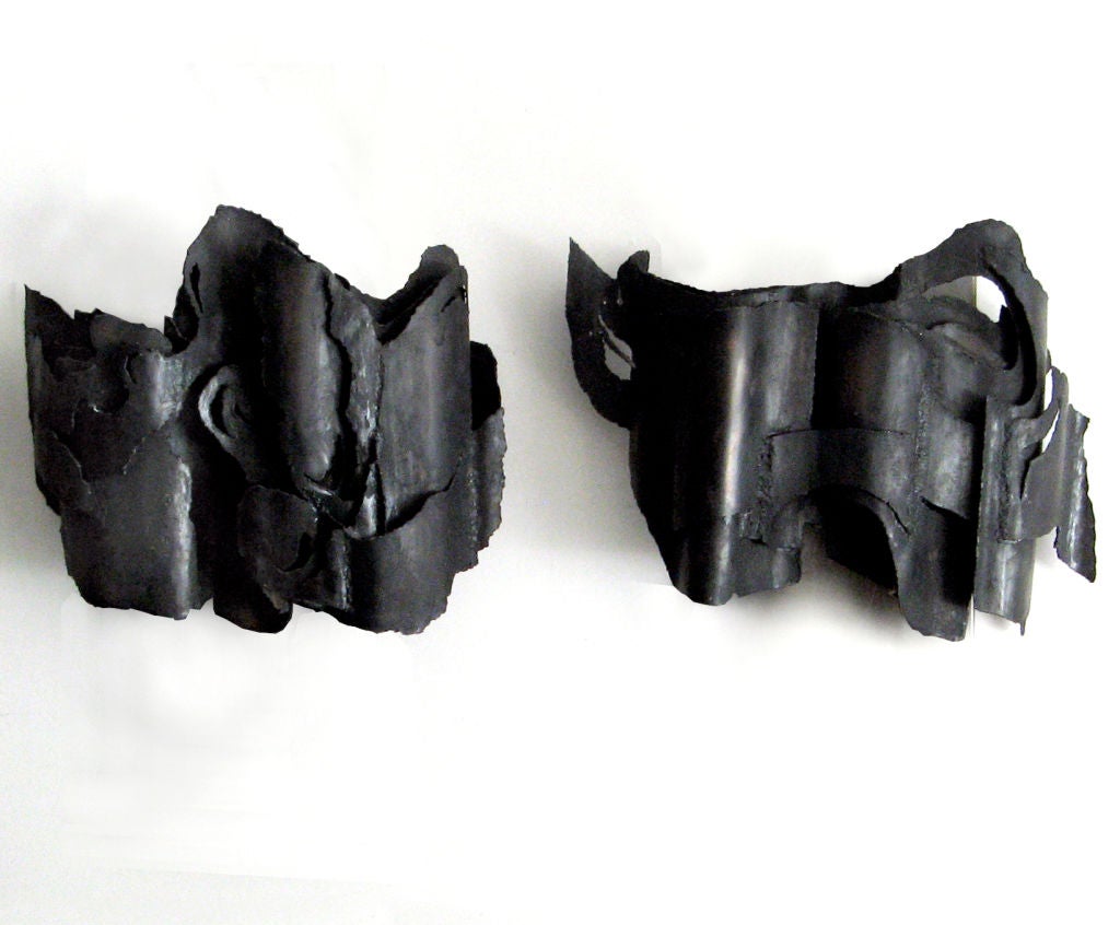 Unique pair of mid-century art studio wall sconces in the style of Paul Evans.  Each sconce has 4 sockets and light is cast up and down onto wall. Height 17