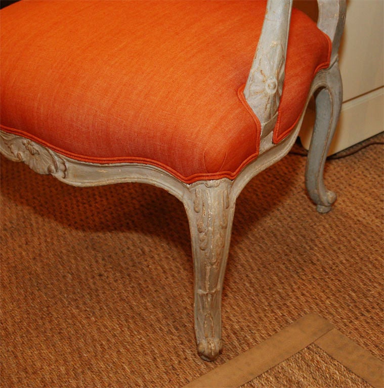 20th Century Painted French bergeres with orange upholstery