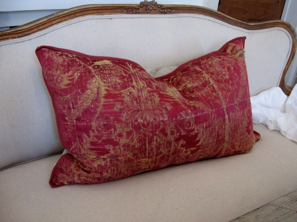 Tattered and torn and absolutely stunning! This is one of my favorite pieces ever. Antique silk fabric with pink/deep red background and gold leafy designs. Thread bare in certain places (as shown in photo) but that only ads to the charm and beauty