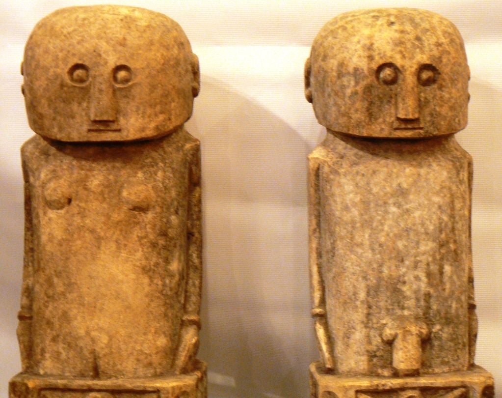 Carved Unique carved male and female stone figures