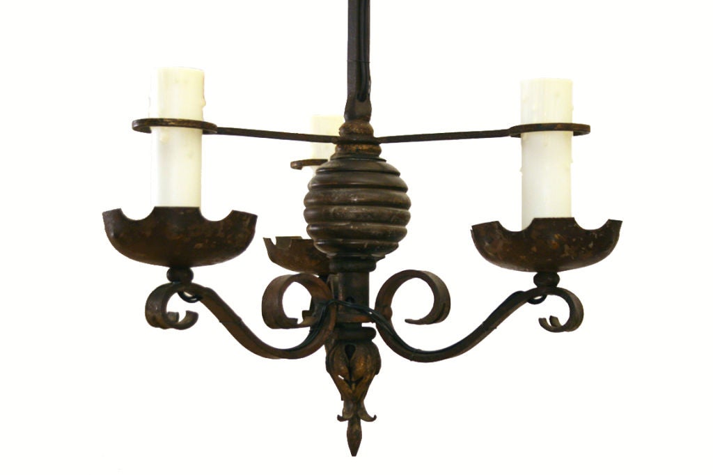 A French Louis Philippe Wrought Iron and Wood 3-Arm Chandelier