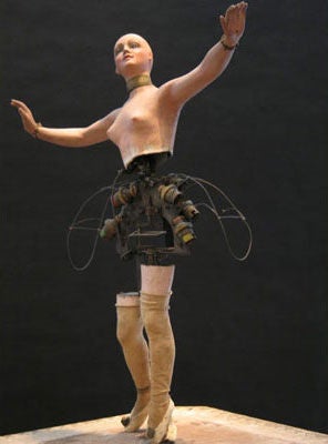 Unusual automaton music box ballerina, working mechanics, articulated side to side and glowing electric lights.