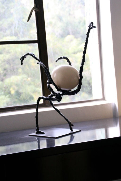 Modernist iron ostrich sculpture with ostrich egg, after Diego Giacometti, c. 1970's.
