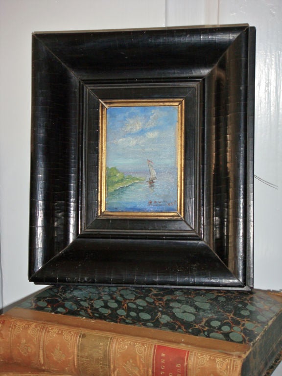 e oMiniature impressionist oil of a sailboat on a sunny day, framed in a beautifully patinated black frame. Dated 1925. Illegibly signed.