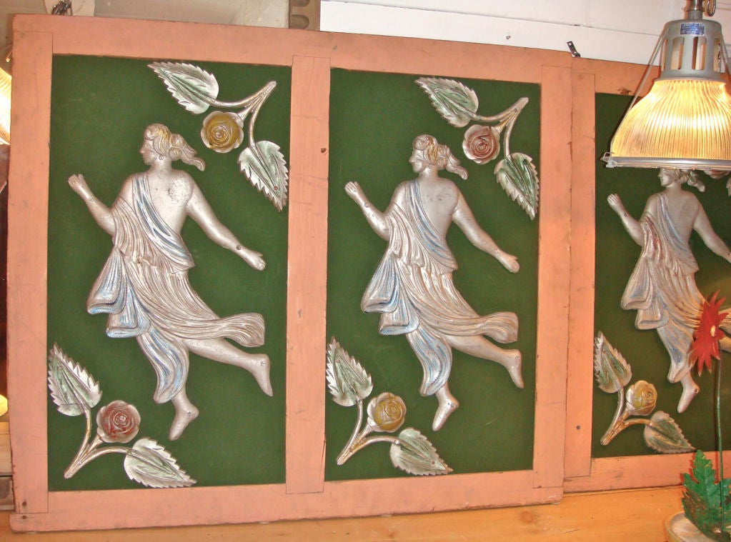 Wonderful pair of carousel panels with cast aluminum figures. Fabulous in a porch or garden room. Can be sold individually.