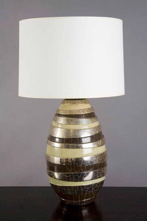 Pair of spiral designed  metallic glazed lamps.