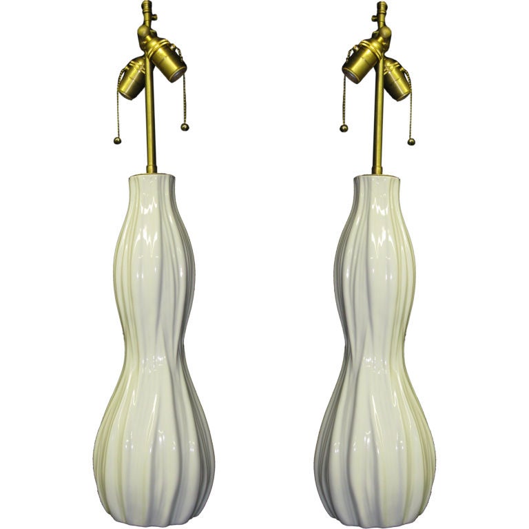 Pair of elegant white  glazed  vessels with lamps application. For Sale