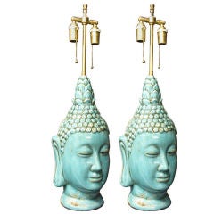 Pair  of glazed ceramic  buddha heads .